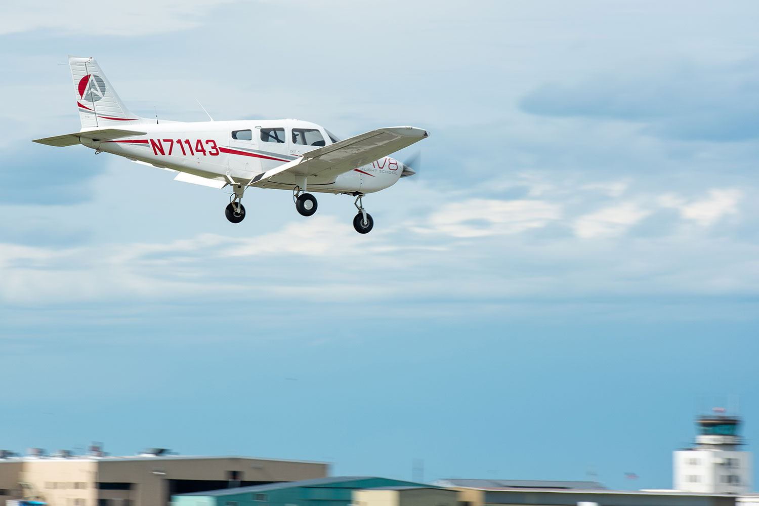AV8-Flight-School-37-AV8 piper archer flying over airport